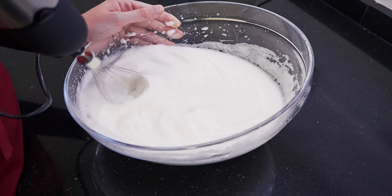 Whisking white powder solution during food ingredient processing
